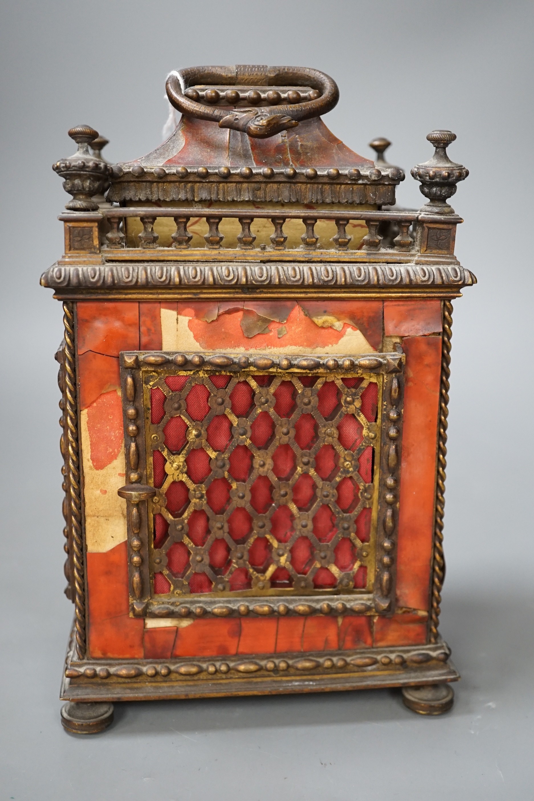 A 19th century French tortoiseshell mantel clock. 24cm high
